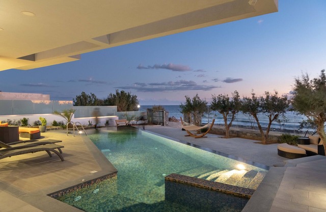 Sea-front suite in luxury contemporary villa with infinity pool & gorgeous views