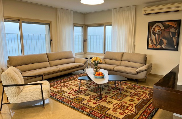 sea view penthouse with 3 floors and an hot tub! can host up to 15 people .n