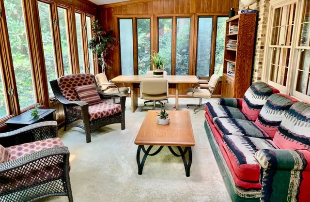 Secluded acreage with in-ground pool, sunroom, & wood fireplace - dog-friendly