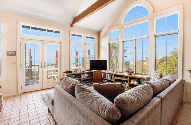 Secluded beachfront home with Pacific Ocean views, fireplace, game room, grill