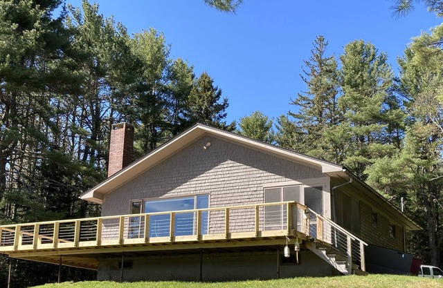 Secluded cottage at water's edge, surrounded by 15 forested acres