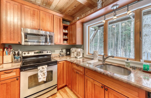 Secluded dog-friendly home with wood-burning fireplace, WiFi & forest views