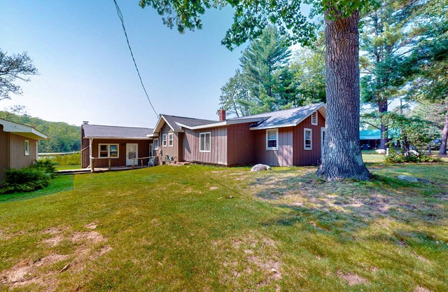 Secluded lakefront home w/private dock, fireplace, & outdoor firepit - dogs OK