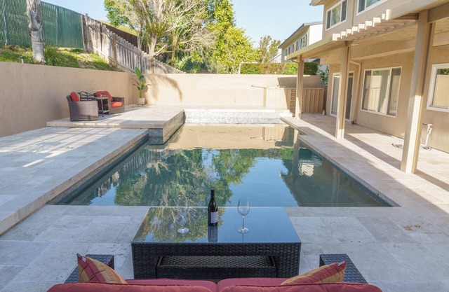Serene Retreat: Pool, Luxury Living & Al Fresco