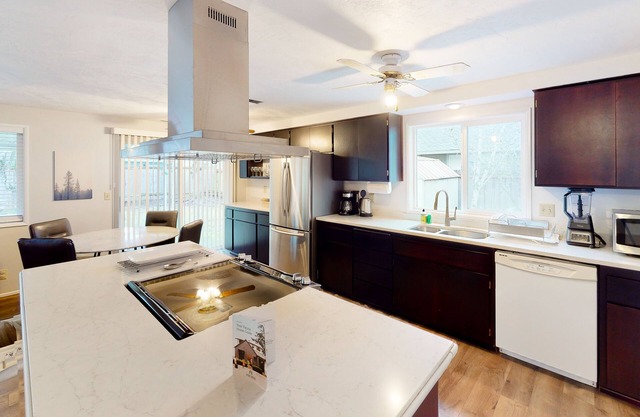 Single-level home with fenced yard, covered patio & central AC