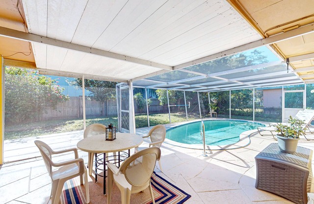 Single-story home near beach with heated private pool, enclosed yard-Dogs ok