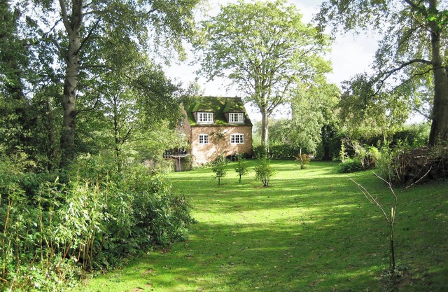 Situated by the banks of a river with private fishing just yards away.