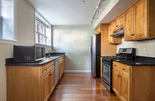 Sleek Porter Square 1BR w/ Gym & W/D, nr T Stops, by Blueground