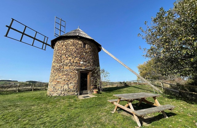 Small mill with garden, near windmills and turbines