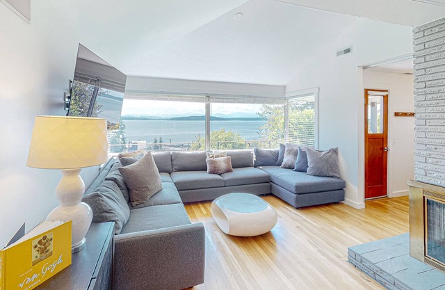 Sound view home with large patio, private putting green & amazing setting