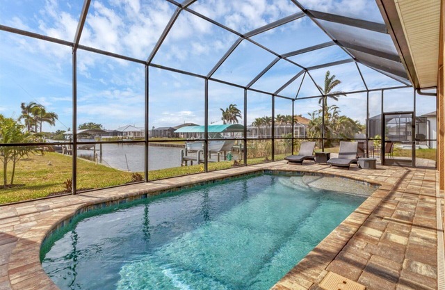 South Gulf Cove 3 Bedroom Canal Pool Home