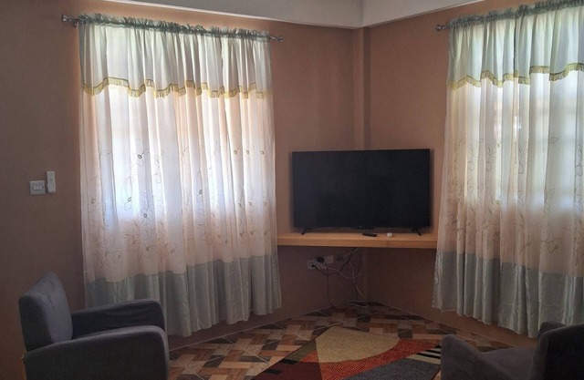 Spacious 2-bedroom apartment with AC, WiFi and parking in serene Pointe Michel