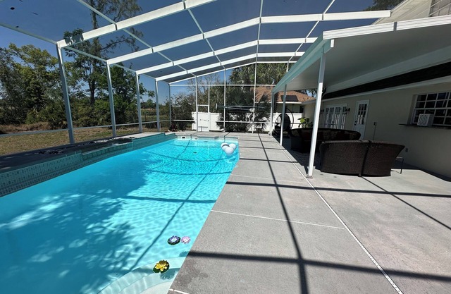 Spacious 4 bedroom 3.5 bath POOL home W/Gym!