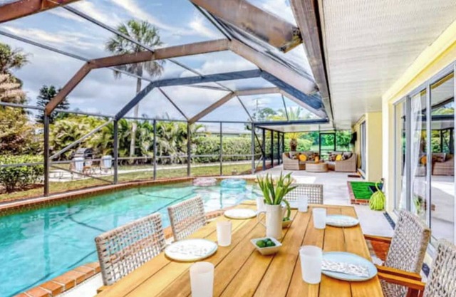 Spacious 4BR Lakefront Getaway – Pool, Hot Tub & Family Fun Near Everything!