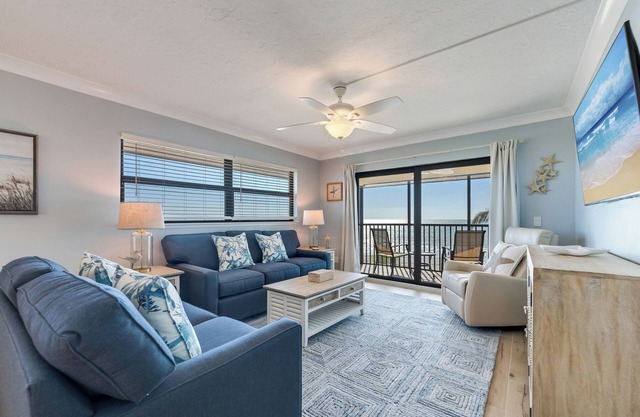 Spacious and lovely seaside decor in this top floor corner unit.