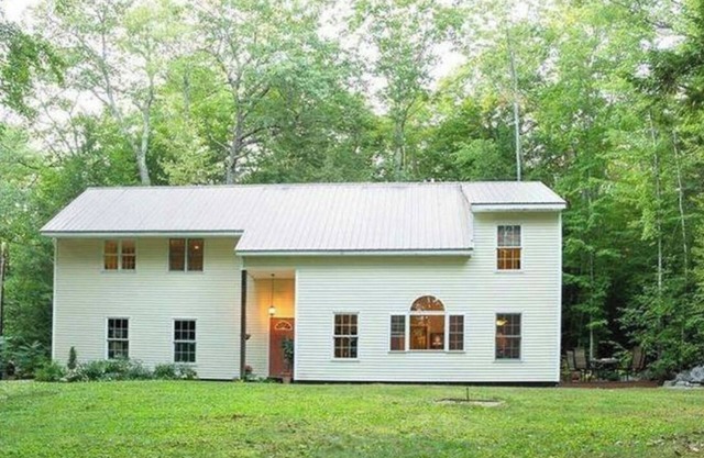 Spacious, cozy home nestled in woods with private outdoor area and fire pit