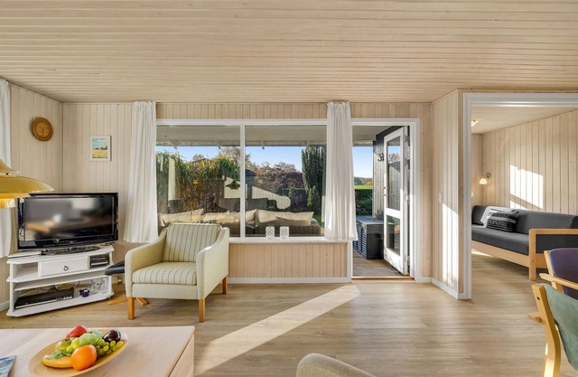 Spacious, family-friendly cottage in a quiet location close to the beautiful sandy beach.