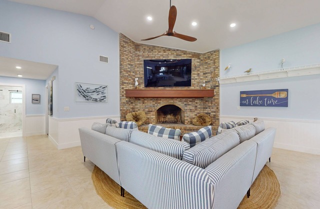 Spacious home with enclosed pool, private lake access, and game room.