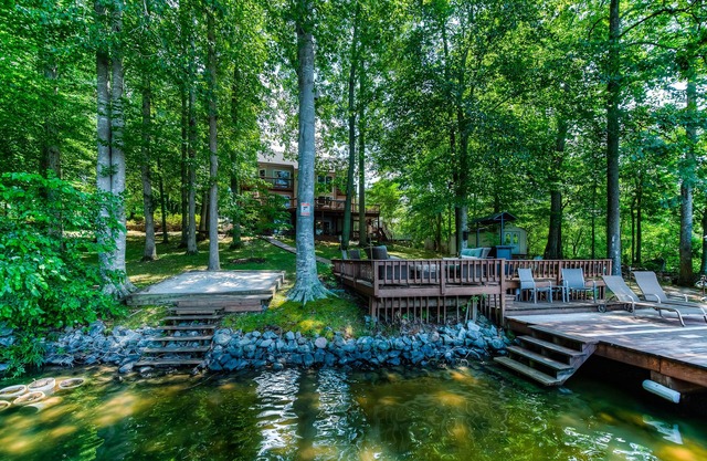 Spacious lake lodge with a private dock, wraparound decks & foosball