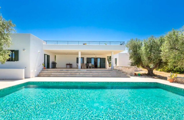 Spacious pool villa with sweeping sea views in extensive olive grove
