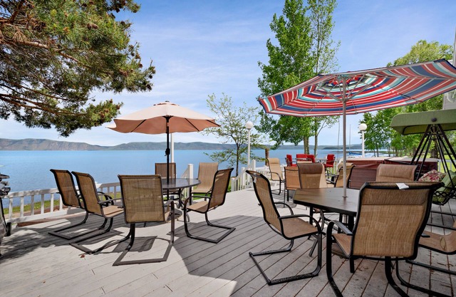 Spacious Waterfront Getaway with Private Hot Tub, Furnished Deck, and Game Room