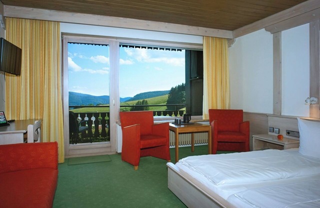 Standard double room, 24sqm, shower/WC with balcony