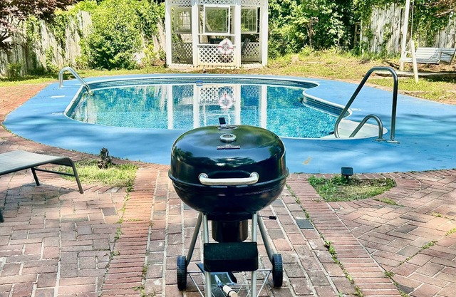 Stay in Style: Beautifully Designed Home with Outside Space/Seating, Charcoal Grill