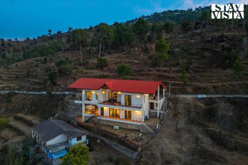 StayVista at Amulyam villa with Lawn & Bonfire