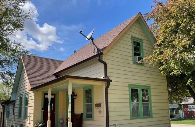 Story and a half home less than a block from Pella's town square.