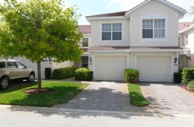 Stunning 1st Floor Waterfront Carriage Home W/Attached Garage