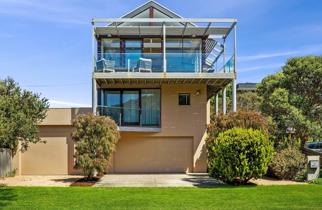 Stunning 3-Storey Coastal Retreat with Breathtaking Water Views