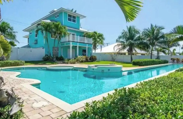 Stunning 4/3 w/Heated Pool, Water View & Arcade!
