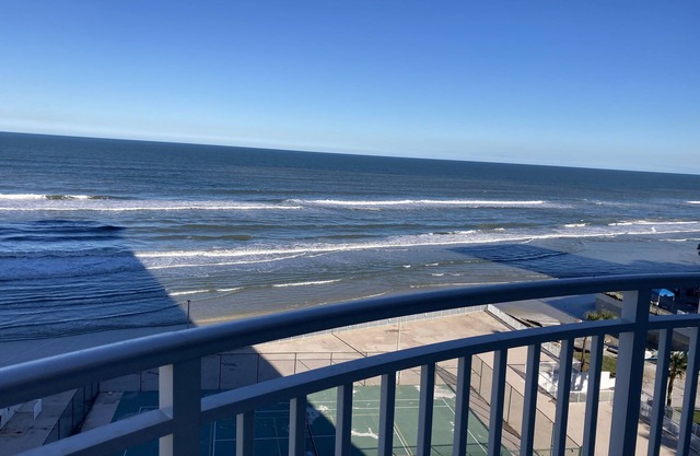 Stunning Beachfront Condo with 360° Ocean Views, Beach Access, Pool & Hot Tub