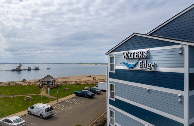 Stunning views, easy beach access from this bay front condo in the Taft District