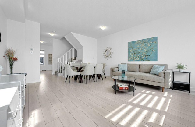 Stylish 4-Bed Home with Backyard in Prime Location