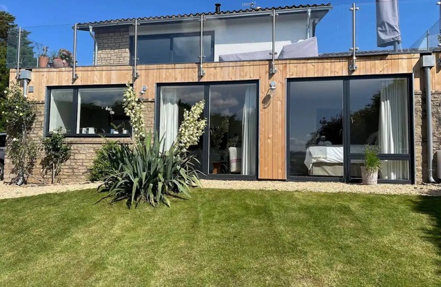 Stylish, light and airy property with wonderful views and garden.