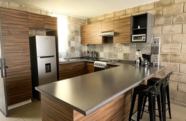 Stylish urban loft with access to gym and work rooms.