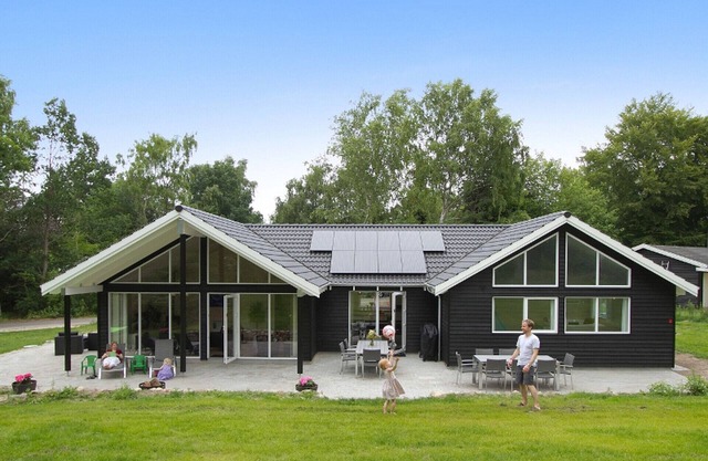 Stylishly furnished poolhouse with activity room for 14 people