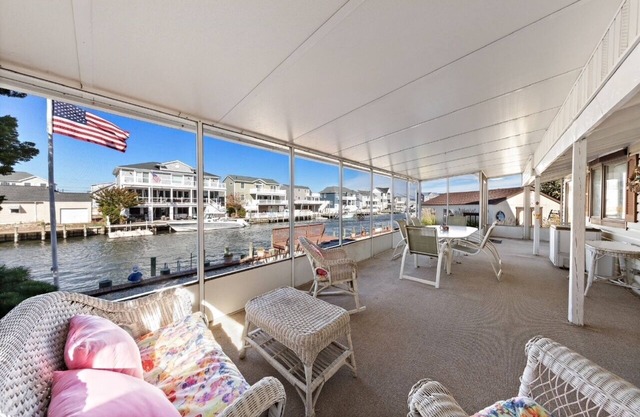 Summer Fun by the Sea with private boat slip, hot tub & screened in porch