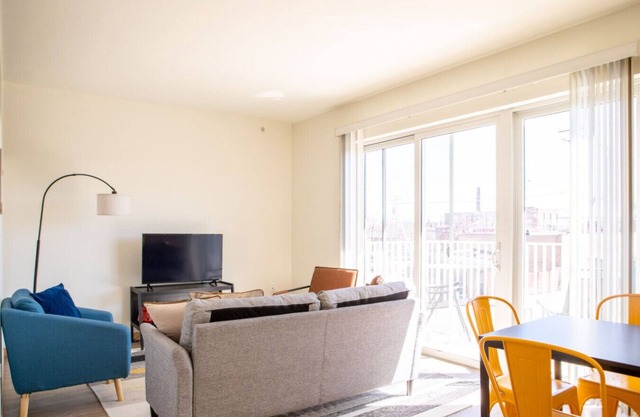 Sunlit Modern Apartment with Balcony