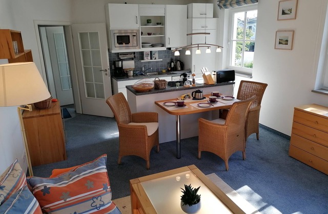 Sunny apartment with south-facing balcony and beach chair