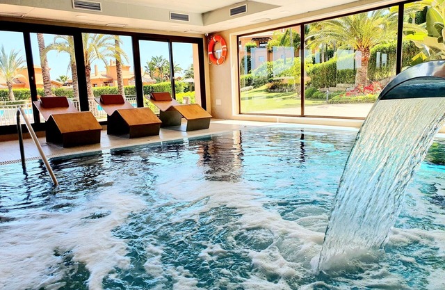 Sunny apartment with large terrace sea and Gibraltar view in luxury golf complex