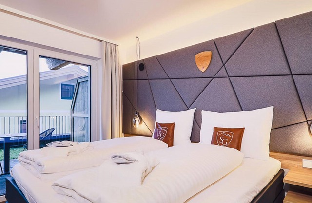Superior Doppelzimmer mit Balkon Flex HP - Hotel Stockinggut by Avenida Leogang
