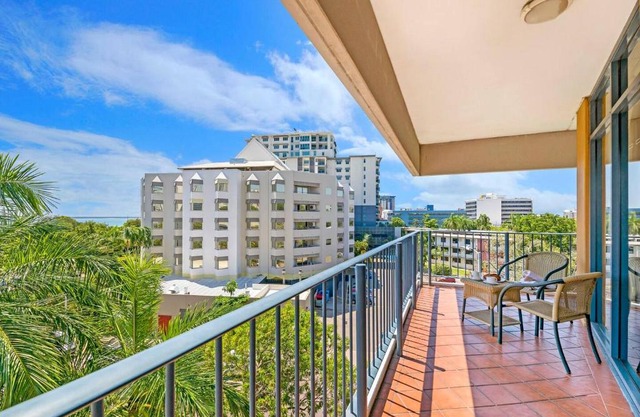 Sweeping Harbourfront Views atop Tropical Resort