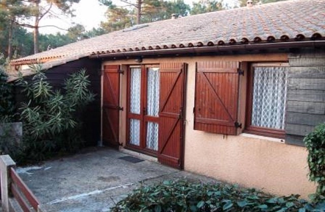 Terraced house of type 3 Mezzanine located in a hamlet in the middle of the pines