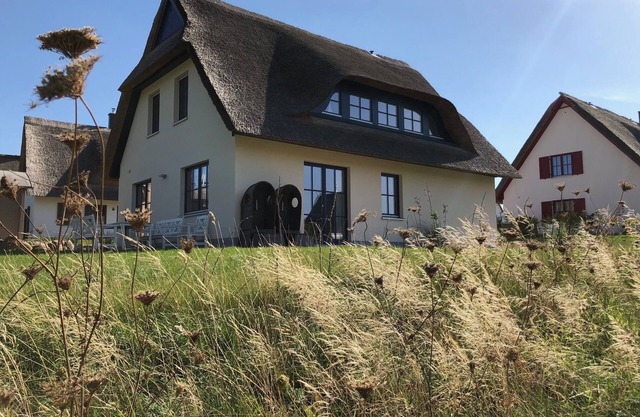 Thatched-roof house Coastline with sauna & fireplace - the perfect break from everyday life!