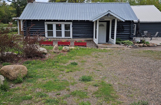 THE 1852 LOG HOUSE.