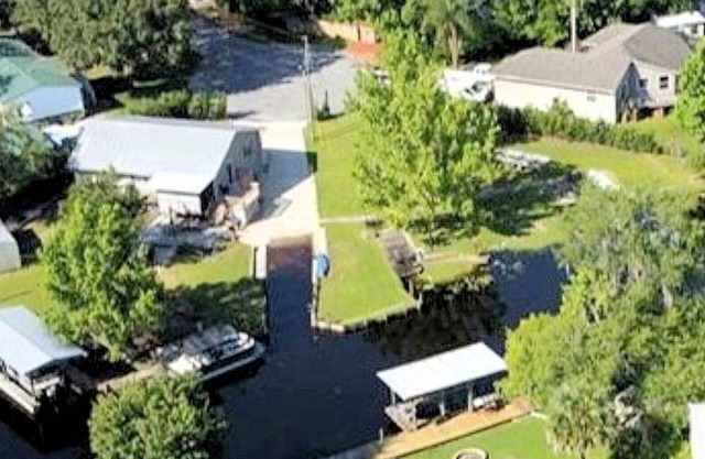 The Launch Pad - House with boat ramp on corner deep water canal lot