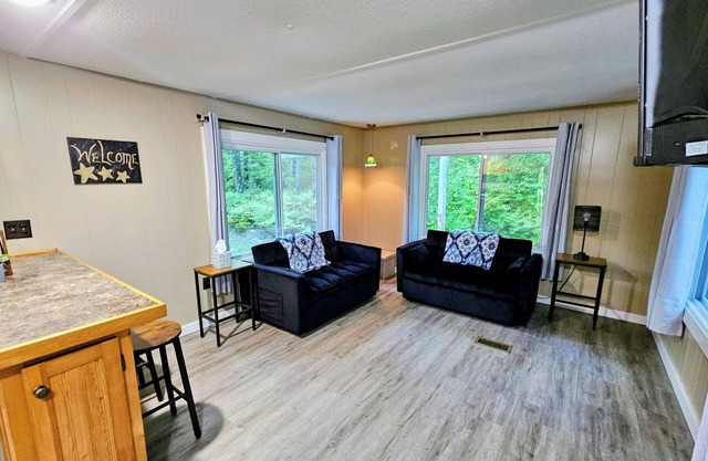 The Northwoods Den- A terrific 2-bedroom house on 9 secluded acres in Luther MI