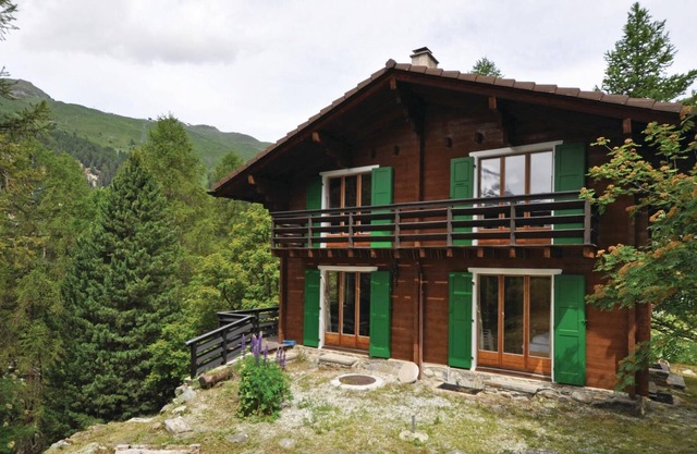 This original wooden chalet in retro style is located in the beautiful Val d'Anniviers, surrounded b